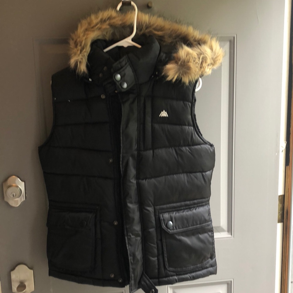 Black Snozu puffer vest with removable hood and “fur”.